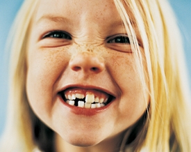Як прорізуються молочні зуби у дітей?