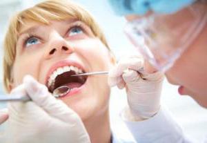 Наліт на зубах чорний: причини і лікування